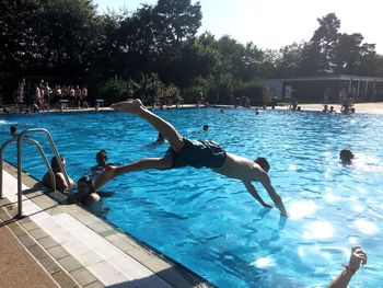 People swimming in pool