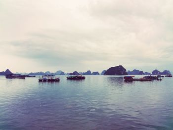 Scenic view of boats in sea