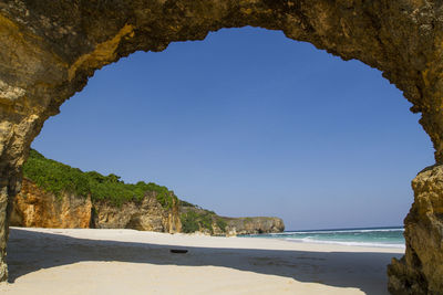 Scenic view of sea against clear blue sky