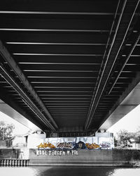 People walking on bridge in city