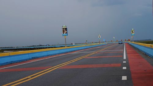 Road in city against sky