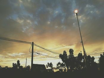 Low angle view of cloudy sky at sunset