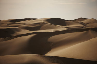 Scenic view of desert against sky