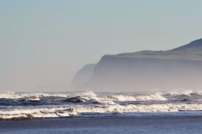 Scenic view of sea against clear sky