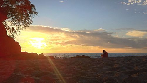 Scenic view of sea at sunset