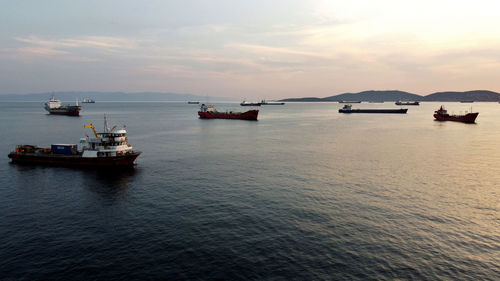 Boats in sea against sky during sunset at istanbul prince islands turkey