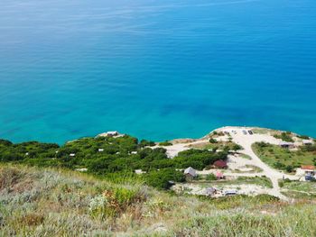 High angle view of beach against blue sky