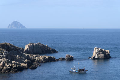 Scenic view of sea against clear sky