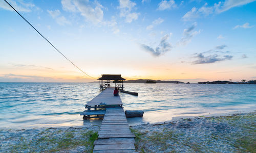 Scenic view of sea at sunset