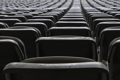 Close-up of empty seats in row