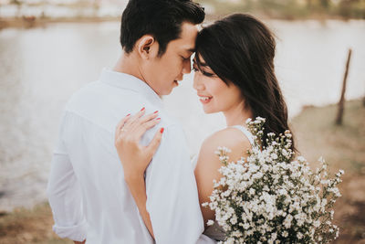 Young couple kissing outdoors