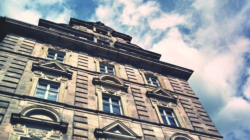 Low angle view of old building against sky