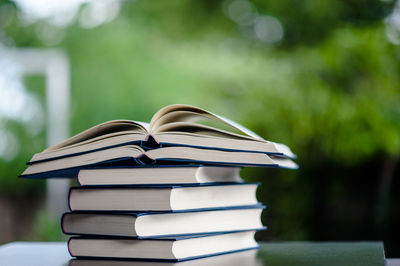 Close-up of stack of books on table