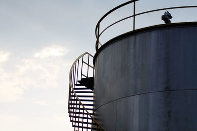 Low angle view of metallic structure against sky