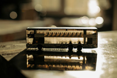 Close-up of old electric lamp on table