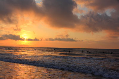 Scenic view of sea at sunset