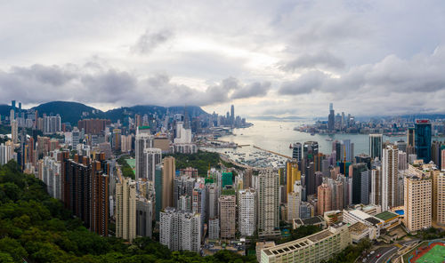 Aerial view of modern buildings in city against sky