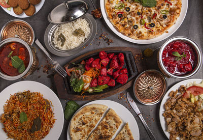 Selection of indian food on a rustic background