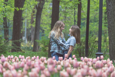 Rear view of women in the forest