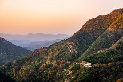 Scenic view of mountains against sky during sunset