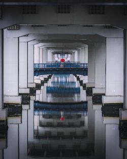 Underneath view of bridge with reflection