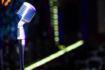 Close-up of illuminated lighting equipment