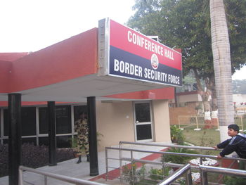 Man standing on entrance of building