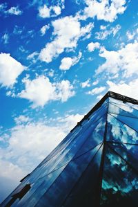 Low angle view of built structure against blue sky