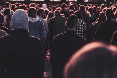 Rear view of people looking at music concert