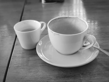 Close-up of coffee cup on table