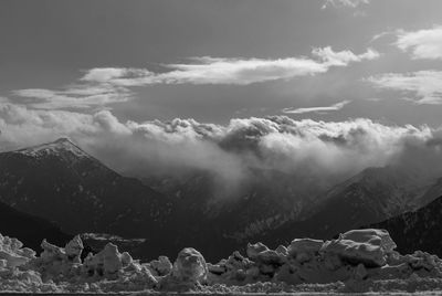 Scenic view of mountains against sky during winter