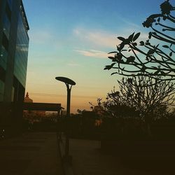 Built structure against sky at sunset