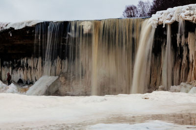 View of frozen waterfall