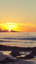 Scenic view of sea at sunset