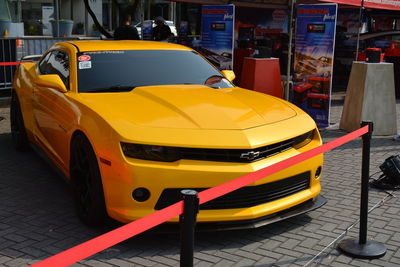 Yellow car on street