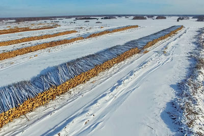 Aerial view of snow covered land