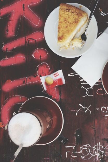 food and drink, indoors, freshness, food, drink, table, still life, coffee cup, refreshment, coffee - drink, plate, high angle view, spoon, healthy eating, ready-to-eat, close-up, breakfast, saucer, fork, cup