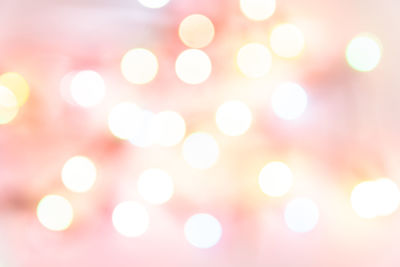 Defocused image of illuminated lights at night
