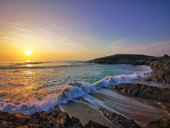 Scenic view of sea against sky during sunset