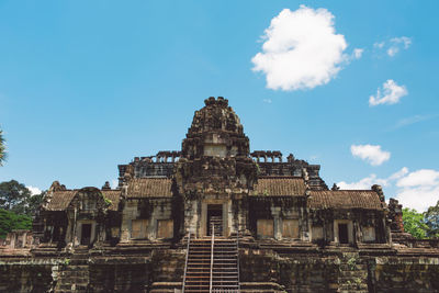 Low angle view of old temple against sky