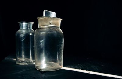 Close-up of bottle against black background