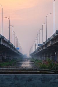 Bridge against sky during sunset