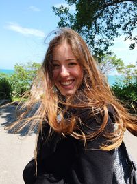 Portrait of a smiling young woman