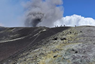 Scenic view of volcanic mountain against sky