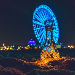 Night at myrtle beach, south carolina. bottle with fairy lights inside