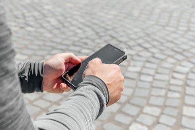 Portrait of a handsome hipster man. a man in a big city with smartphone, a life style concept