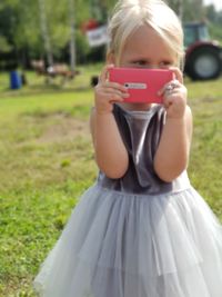 Portrait of a girl in a field