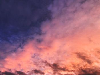 Low angle view of dramatic sky during sunset