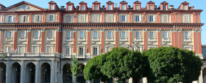 Panoramic shot of historic building against sky in city