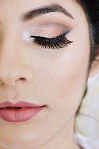 Close-up of young woman with make-up 